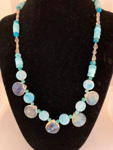 Lemon Quartz, Amazonite, and Turquoise Necklace

This necklace promotes tranquility, healing, and wholeness.