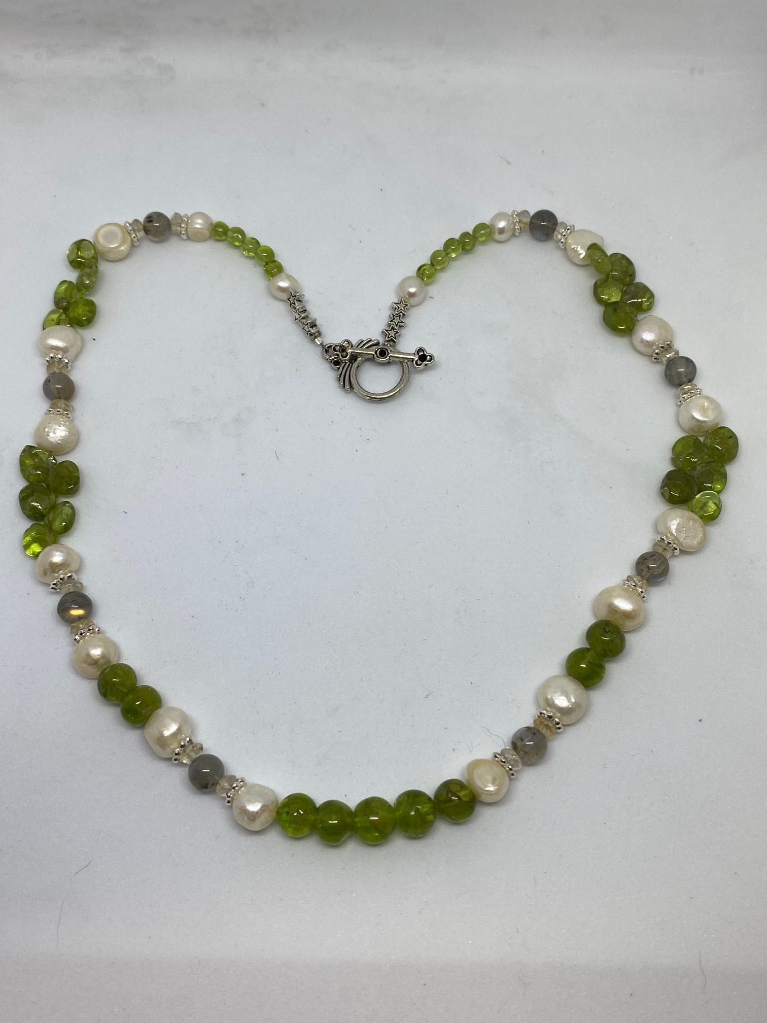 Peridot, Pearl, and Labradorite Necklace. This necklace promotes Prosperity, Tranquility, and Protection. 