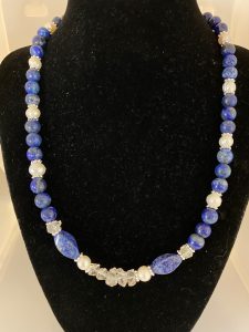Lapis Lazuli, Herkimer Diamond, and Pearl Necklace.

This necklace promotes Manifestation, Bliss, and Wisdom. 