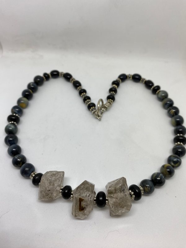 Blue Tiger Eye, Herkimer Diamond, and Jet Necklace. This necklace promotes Clear Communication, Psychic Development, and Protection. 