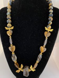 Blue Tiger Eye, Herkimer Diamond, and Jet Necklace.

This necklace promotes Grounding, Life Vitality, and Protection. 