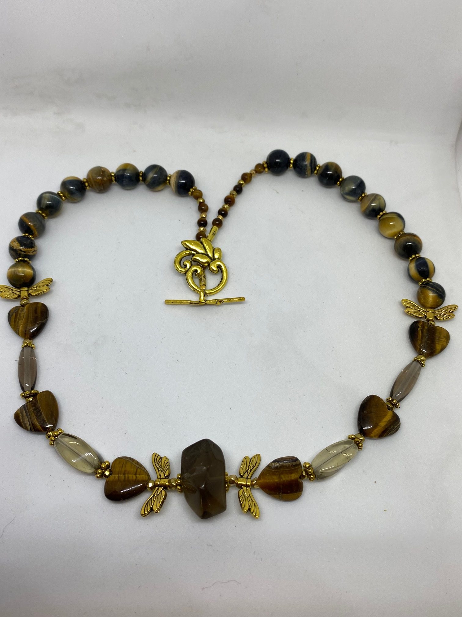 Blue Tiger Eye, Herkimer Diamond, and Jet Necklace. This necklace promotes Grounding, Life Vitality, and Protection. 