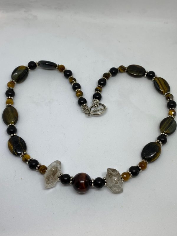 Blue Tiger Eye, Herkimer Diamond, and Jet Necklace. This necklace promotes Happiness, Personal Power, Psychic Development, and Protection. 