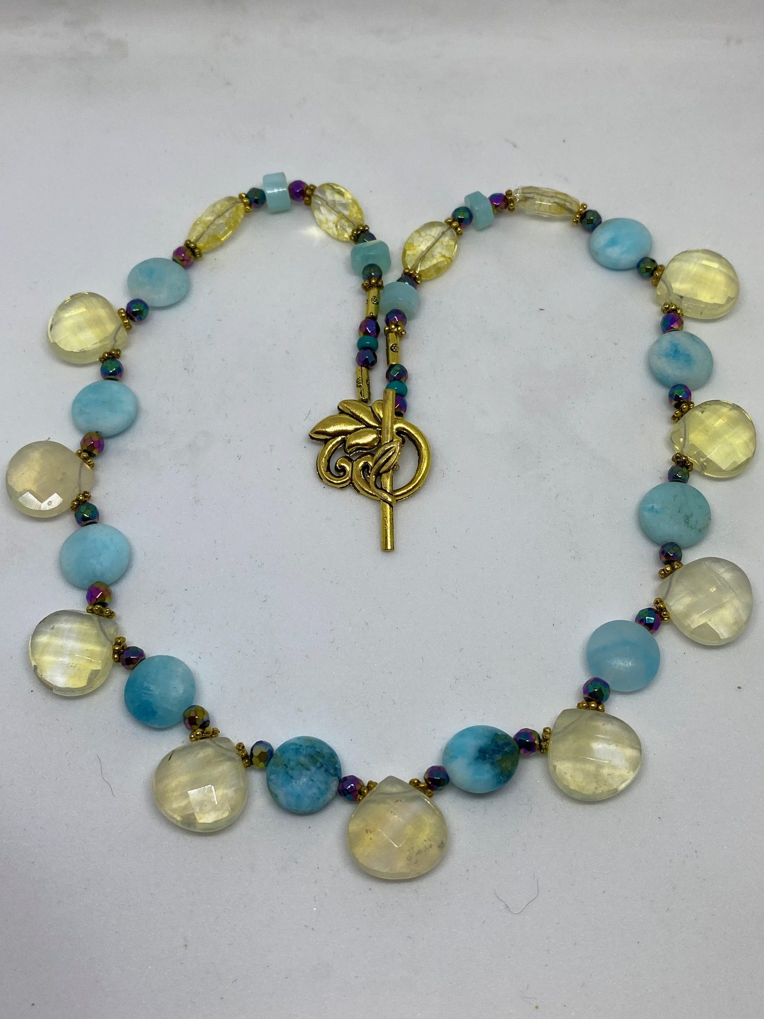 Lemon Quartz and Amazonite Necklace This necklace promotes tranquility, healing, and wholeness. 