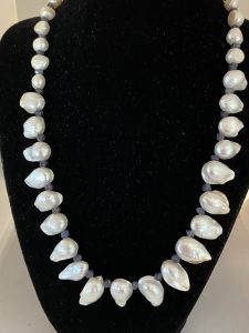 Pearl and Iolite Necklace

Beautiful as it is, this necklace supports Vision and Focus. 
