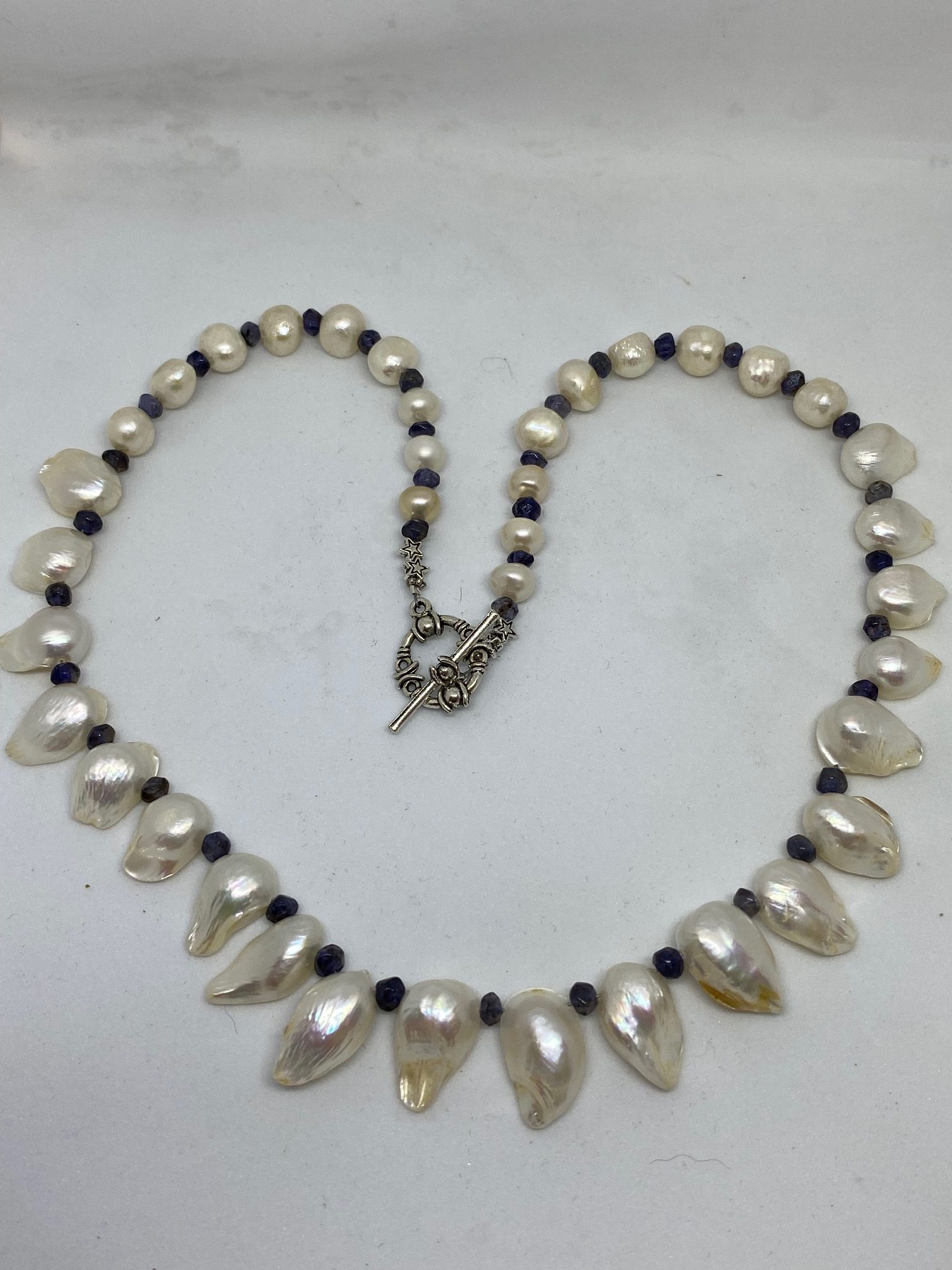 Pearl and Iolite Necklace Beautiful as it is, this necklace supports Vision and Focus. 