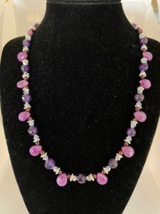 Lavender Jade, Amethyst, and Garnet Necklace This necklace supports Peace, Prosperity and Protection.