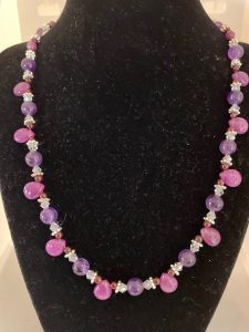 Lavender Jade, Amethyst, and Garnet Necklace

This necklace supports Peace, Prosperity and Protection.