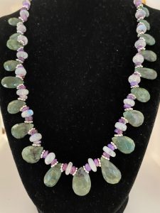 Emerald, Moonstone, and Sugilite Necklace

This necklace supports Success, Good Fortune, and Your Inner Light.