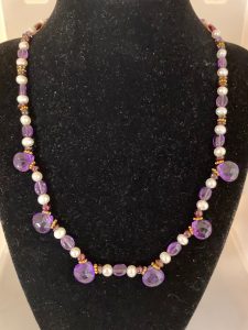 Amethyst and Pearl Necklace

This necklace supports Focus, Intuition, and Integrity.