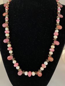 Rhodochrosite, Pearl, and Swarovski Crystal Necklace

This necklace supports Joy and Tranquility
