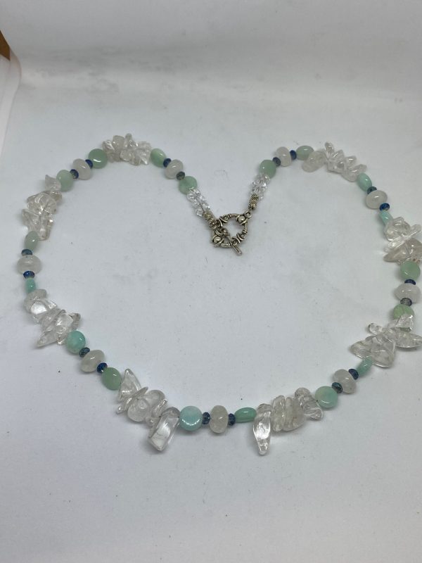 Clear Quartz, Amazonite, Moonstone, and Swarovski Crystal Necklace This necklace brings emotional support on all levels as well as joy.