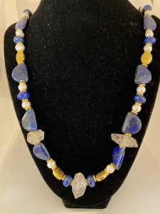 Lapis, Pearl and Elestial Quartz Necklace

Promotes Manifesting from the Heart.
